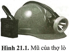 Chiếc mũ của người thợ lò (hình 21.1) có một bóng đèn LED, một công tắc và một acquy và các dây dẫn điện. Em hãy vẽ sơ đồ mạch điện của chiếc mũ.